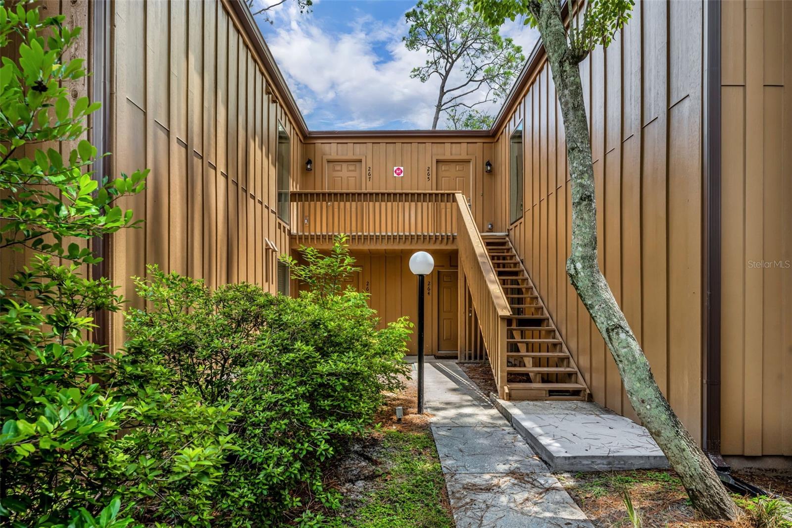 Welcome to 267 Crown Oaks Way—a fully renovated 2-bedroom, 2-bathroom second-floor condo tucked inside the one-of-a-kind Springs community in Longwood. Bright and inviting, the home features soaring 13-foot vaulted ceilings, an oversized laundry room, and stylishly updated bathrooms. Natural light floods the open living space, while the balcony offers peaceful, wooded views.
Located in a guard-gated, nature-focused neighborhood, residents enjoy exclusive amenities like a spring-fed swimming lagoon, community pool, hot tub, tennis and pickleball courts, horse stables, and scenic walking trails. With water and sewer included in the HOA, plus 24-hour security, this home offers comfort and convenience in a truly special setting.
Just minutes from shopping, dining, and parks—and less than 30 minutes to Downtown Orlando—this move-in-ready condo blends modern living with a laid-back, resort-style lifestyle.