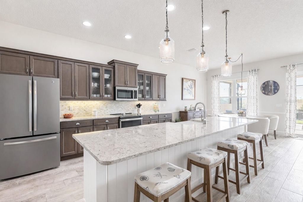 Photo of 112 Portofino Blvd, New Smyrna Beach, FL 32168 (MLS # V4947488)