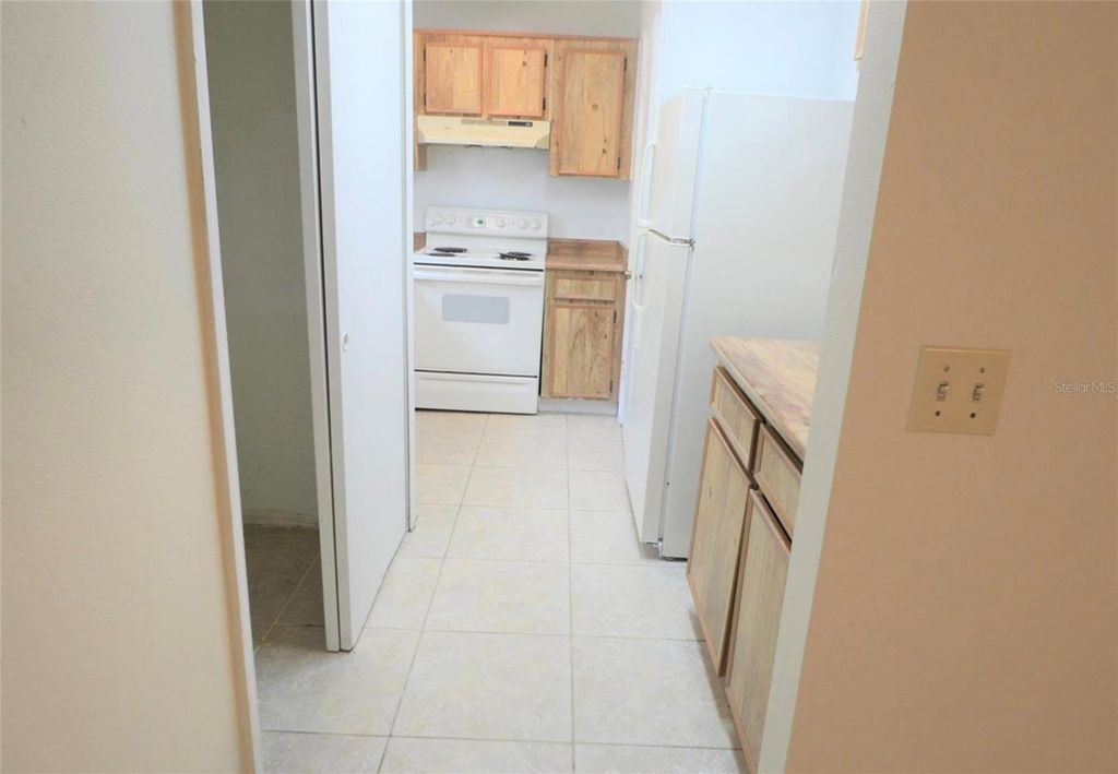 Photo of 4240 Pershing Pointe Place #2, Orlando, FL 32822 (MLS # O6396620)