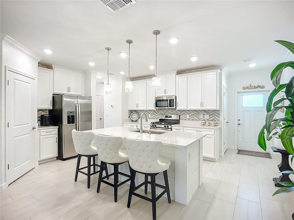 Photo of 17576 Holly Well Avenue, Wimauma, FL 33598 (MLS # TB8441199)