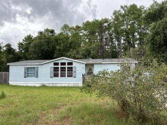 3 Bedroom 2 bath double wide mobile home. Totally remodeled new carpet, new flooring, new HVAC. Completely fenced and very private, no neighbors on each side or behind. Enjoy the quiet country life with conveniently located. Public Moon Lake and boat ramp with park.