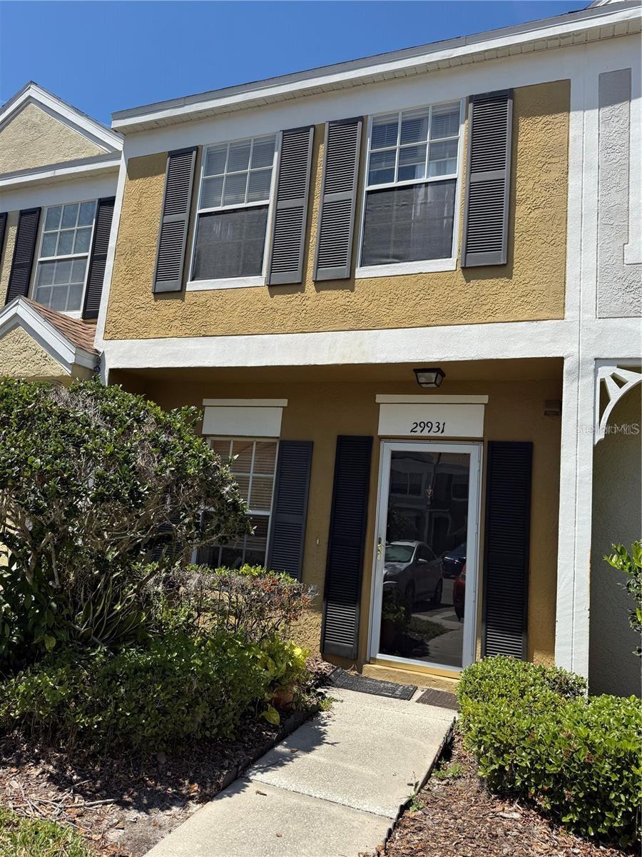 Nestled in the heart of Wesley Chapel, Pasco County, this charming 2-bedroom, 2.5-bathroom townhouse offers a blend of comfort and convenience. Located in the gated community of Covina Key at Meadow Pointe. The home offers a master bedroom with volume ceilings, 2 closets and master bath with shower and tub. Peaceful nature views from your screened lanai which features a convenient storage closet. Enjoy an amazing experience in the community center with their pool, tennis courts, playground and basketball courts. Don't miss out on the opportunity to make this property yours and schedule a showing now!