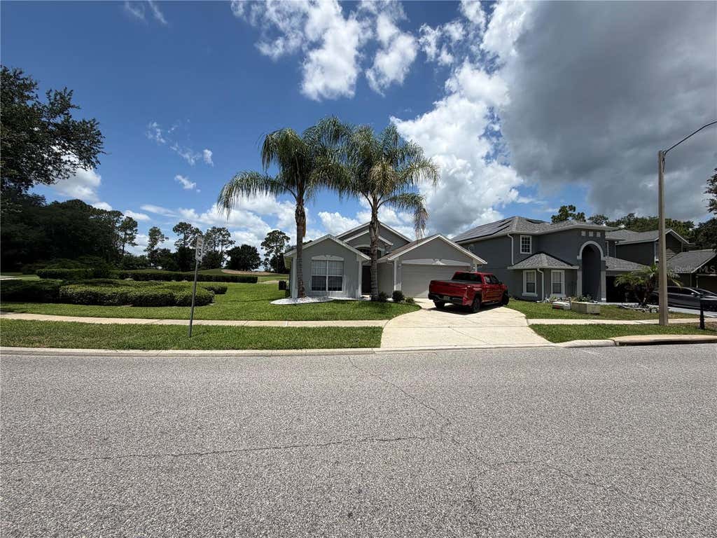 Photo of 2004 Hemingway Avenue, Haines City, FL 33844 (MLS # TB8530312)
