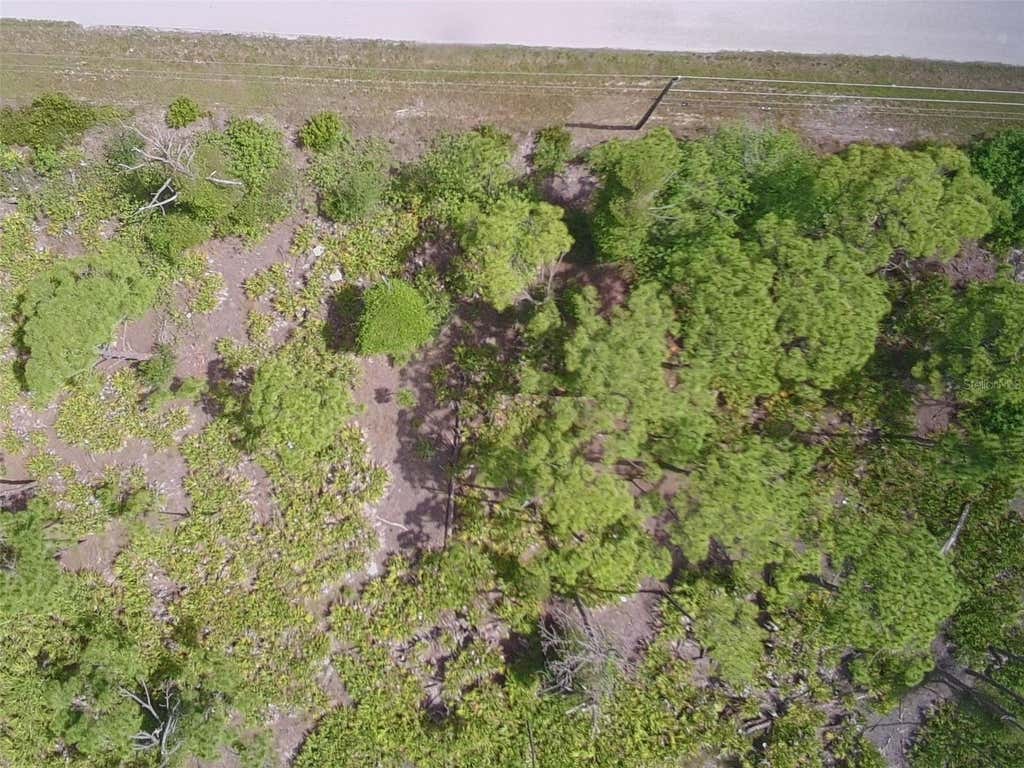 Photo of 14200 Naylor Avenue, Port Charlotte, FL 33981 (MLS # A4701382)