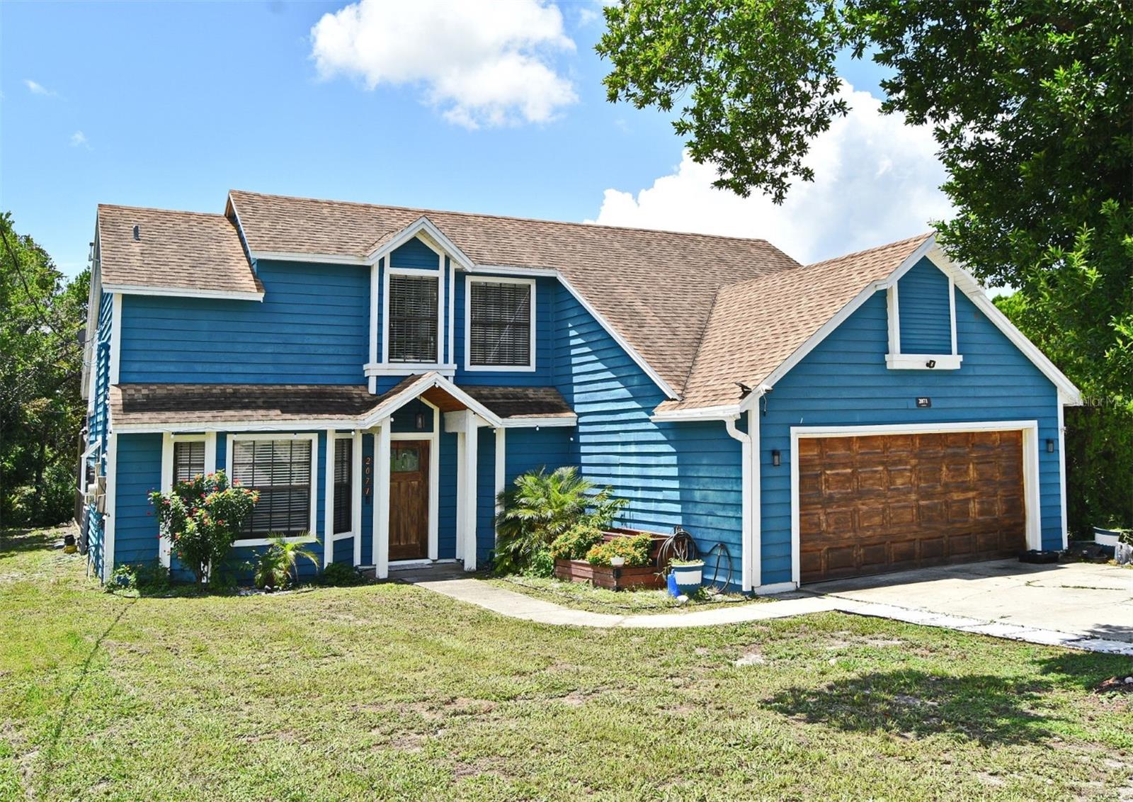Beautiful 3 Bedroom 2.5 bath 2 car garage pool home on .37 acres is waiting for you. The large kitchen with eat in area boasts granite countertops and soft-close cabinetry, a single-basin sink, upgraded stainless-steel appliances and fixtures and a beautiful bay window. A BRAND-NEW ROOF and the AC SYSTEM was installed in 2019. The 14 X 15 downstairs master suite boasts soaring ceilings and a massive walk-in closet, while the master bath features dual granite-topped vanities, a step-in shower, and a free-standing soaking tub. This home features tons of storage. The main living area includes a wood-burning fireplace and is open to the dining area and features dual entrances to the screened in pool and the huge back yard. Bedroom two and three located on the second floor are comfortable size and include a walk-in closet. Minutes from I-4, Deltona Golf Course, Orlando and the beaches are an easy reach. All measurements are approximate and should be independently verified.