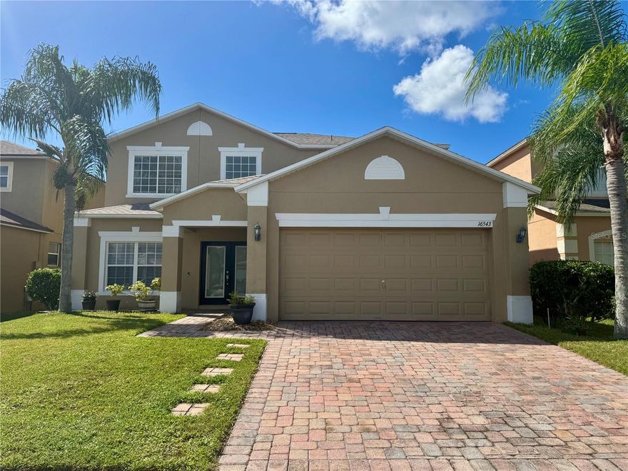 WATERFRONT HOME!! Welcome to this absolute stunning home nestled in the heart of Orlando's East side community. Currently located in Timber Isle, which is a gated community in Avalon Park. This home is conveniently located near Waterford Lakes, shopping centers, Avalon Town Center, Valencia Community College, UCF & A rated schools. This beautiful home features an open floor plan that consist of 5 bedrooms, 3.5 bathrooms, 2 car garage, and a paved driveway. Over 2,500 sqft of living space awaits you with many upgrades such as 42" cabinets, stainless steel appliances, laminate flooring, upgraded light bulbs and much more. Downstairs is the primary bedroom that brings in an abundance of natural light with a sliding door for easy access to outdoors. The primary bathroom consists of double vanity with ample space for his & hers with a garden tub, walk in shower and separate closets. Remaining bedrooms are upstairs with two full size bathrooms. In addition, this community offers an abundance of amenities such as basketball court, playground, Picnic area, and tennis court. This home will not last long, schedule your showing today!