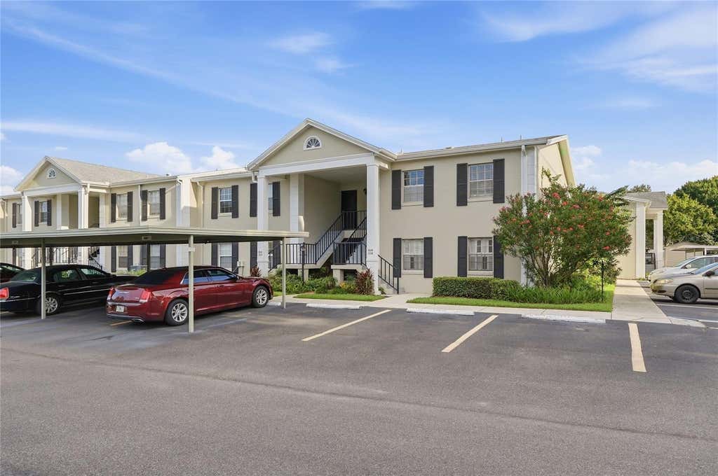 Photo of 689 Lake Howard Drive NW #213, Winter Haven, FL 33880 (MLS # L4963853)