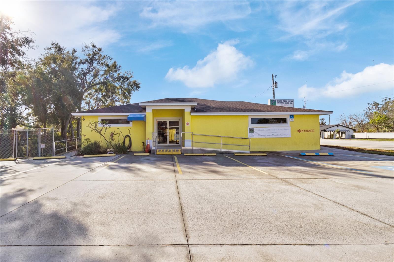 ****Two Buildings 1 Price! This property is only sold with 524 1ST ST S WINTER HAVEN FL 33880 see MLS ID L4949798. ******This 2,300-square-foot retail storefront is perfectly situated in the heart of Winter Haven, offering maximum visibility on a high-traffic main road. The property boasts an inviting entry with double glass front doors that create a welcoming and professional first impression. Zoned C-3, this versatile space features a thoughtfully segmented layout, ideal for retail, office, or mixed-use configurations. It includes two bathrooms, one of which is ADA compliant, ensuring accessibility for all customers and staff. The property is further enhanced by ramped entry points and a well-maintained parking lot, providing convenience and ease of use. With its prime location, excellent curb appeal, and flexible design, this storefront is an outstanding opportunity for businesses looking to thrive in Winter Haven's bustling commercial district.