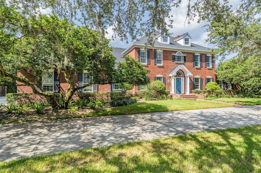 Welcome to your Dream Lakefront Retreat! This stunning 6-bedroom, 5-bathroom luxury home offers an unparalleled combination of elegance, privacy, and breathtaking views. Nestled on 4.41 acres with a private gated entrance and a picturesque tree-lined driveway, this custom brick home is a true gem. Step inside and be captivated by the grandeur of the 2-story family room, adorned with a dramatic double-height fireplace and French doors that open up to the magnificent lake views. The custom woodwork and built-ins add a touch of sophistication to the space. Entertaining is a delight in the well-appointed formal dining room, while the adjacent office provides a quiet sanctuary for work or study. The professional kitchen is a chef's dream, featuring top-of-the-line appliances such as a Sub-Zero refrigerator and freezer, a 6-burner Wolf gas range, a Bosch dishwasher, ice maker, refrigerator drawers, and 2 wine refrigerators. The butler's pantry and walk-in pantry offer ample storage and convenience. Retreat to the first-floor primary bedroom, boasting a cozy fireplace, spacious walk-in closets, and a spa-like bathroom where you can unwind and rejuvenate. The grand staircase leads to the second and third bedrooms on the second floor, connected by a stylish jack and jill bathroom. The fourth bedroom features an en-suite bathroom for added privacy. Need additional space? The third level offers a separate bonus/storage/attic area, perfect for customization to suit your needs. Step outside and embrace resort-style living with a sparkling pool, spa, and a shaded playground for endless fun and relaxation. Indulge in the joy of harvesting your own produce from the garden, which is currently growing many fruits and vegetables. And there are various fruit trees around the property. As if this wasn't enough, there's also a detached guest house that has been beautifully upgraded, complete with a kitchenette, 1 bedroom, and a full bathroom. The attached 6-car garage has been converted into an air-conditioned gym, providing ample space for your fitness needs. Additional features of this remarkable property include custom cabinetry, Electrolux washer and dryer, newer roofs, HVAC, and water heater, upgraded plumbing fixtures, plantation shutters, a 3-car side entry garage in the main home, a central vacuum system and a home generator. Don't miss out on the opportunity to live the ultimate lake life in this extraordinary home. Contact us today to schedule your private showing and start living the life you've always dreamed of!