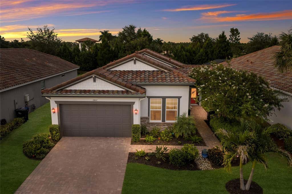 Photo of 13807 American Prairie Place, Lakewood Ranch, FL 34211 (MLS # A4703825)