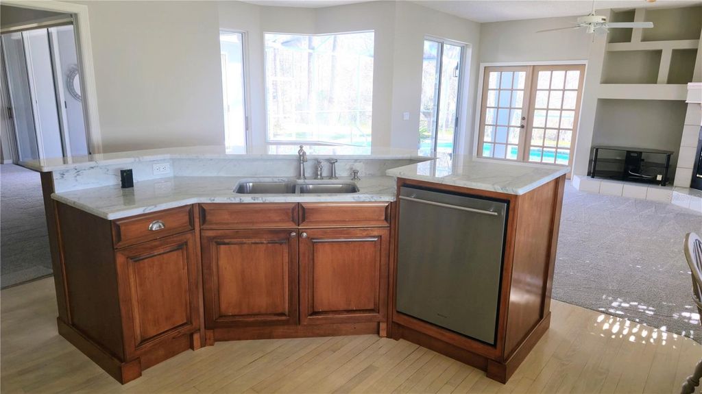 Photo of 1003 Berkshire Lane, Tarpon Springs, FL 34688 (MLS # TB8370121)