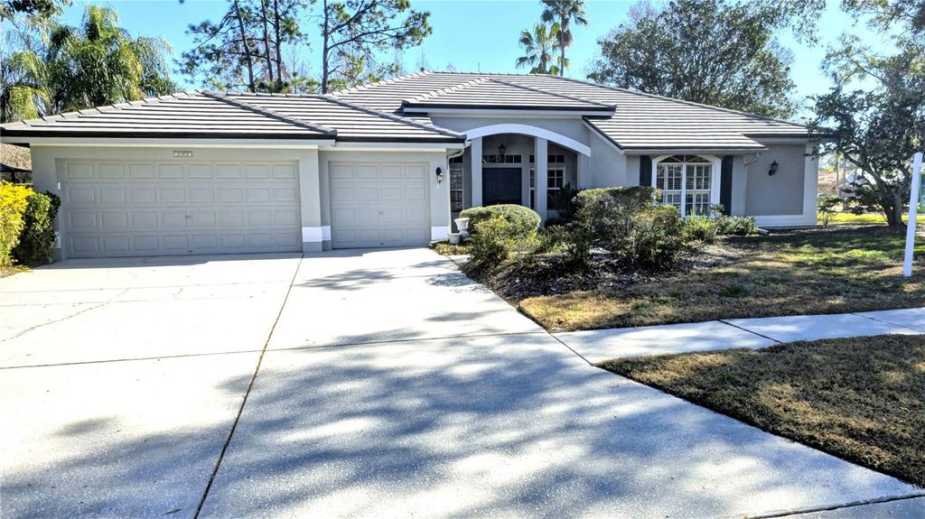 Photo of 1003 Berkshire Lane, Tarpon Springs, FL 34688 (MLS # TB8370121)