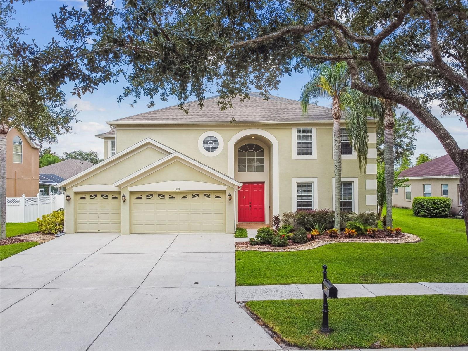 One or more photo(s) has been virtually staged. This beautiful, MOVE-IN ready 5 bedroom, 3 bath, 3 car garage pool home is located in the gated community of West Meadows in Tampa Palms. The spacious Eat-in Kitchen has soft grey cabinetry, windowpane accents, quartz countertops with large island, stainless-steel appliances (including a gas range), crown molding and built ins. Upgrades: New Lighting Fixtures, Interior paint, Remodeled bathrooms w/granite countertops, Water softener, plus much more! Home includes two Living Rooms that are very spacious to create an open floor plan w/tile throughout. Two sets of sliding glass doors that lead you out to large screened in lanai, saltwater pool w/pebble finish and waterfall. A bedroom (which can be used as an office or guest room) is located off of the main living room and a full bathroom with a standalone shower w/a door that walks out to the pool area. Upstairs is the Owner's Suite that features crown molding, a large sitting area, claw foot bathtub, frameless glass shower & very spacious walk-in closet. The 2nd floor also features bedrooms 2 and 3, a full bathroom, granite countertops, dual sinks, shower/tub combo and a large media room (can be used as bedroom 5). The 3 car Garage has an epoxy floor finish, new painted walls and ample shelving for additional storage. Roof (2017), A/C (2021) and Hot Water Heater (2010). Situated on 1/4 acres, custom saltwater pool and fully fenced in back yard makes this home perfect for entertaining. Low HOA which includes: 2 community pools, splash pad, fitness center, playground, club house and tennis/basketball/sand volleyball courts, soccer field & baseball diamond. Conveniently located near I-75, I-275, The Tampa Premium Outlet Mall plus A rated schools and hospitals. Schedule your private showing today!