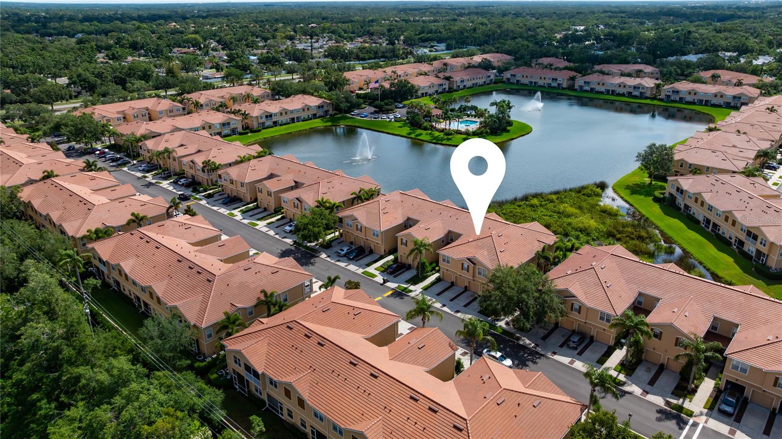 LOCATION, LOCATION, LOCATION! North Sarasota 3 bedroom 2 bathroom condo in the sought-after, pet-friendly GATED community of Parkridge, with easy access to I-75 (only 4 miles away), the bustling University Parkway Corridor, numerous restaurants, UTC Mall, and Benderson Park. You're just 6 miles from the vibrant Downtown Sarasota, 9 miles from stunning Lido Beach, and a short drive to the world-renowned Siesta Beach.This unit boasts a great layout that includes a flex space downstairs and another upstairs between the secondary bedrooms, providing an ideal space for and carpet in the bedrooms and throughout the rest of the upstairs. Enjoy the convenience of an open floor concept, stainless steel appliances, hard surface countertops, and luxury vinyl flooring. Additional highlights include a one-car garage and lake views from your private lanai. The spacious master suite offers walk-in closet and an en-suite bathroom, creating a private sanctuary for your personal retreat. Experience the joys of maintenance-free living, with the community handling ground maintenance, pool maintenance, pest control, also covering your basic cable and WATER—all included with your HOA dues and PAID BY the LANDLORD! Don’t miss out on this fantastic opportunity.