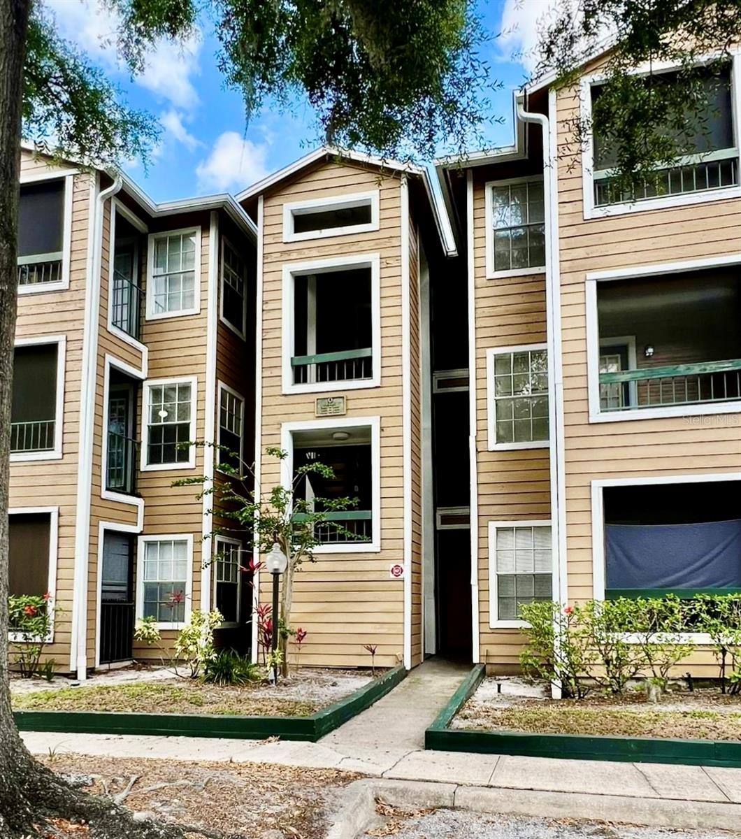 Charming and beautifully maintained 1-bedroom, 1-bath condo located on the second floor of the highly desirable Regency Gardens community in Orlando. This inviting home showcases an open floor plan filled with natural light, a spacious living area, and an adjacent galley kitchen with all appliances included, abundant pantry space, and a utility closet with washer and dryer. The bedroom offers a walk-in closet for excellent storage, while the fully tiled floors add ease of maintenance throughout. Step outside to your screened balcony overlooking one of the community pools, the perfect spot to relax and unwind. The community offers resort-style amenities, including two sparkling pools, a fitness center, clubhouse, tennis court, and play area, with scenic sidewalks for leisurely strolls. Ideally situated near shopping, dining, easy access to main highways, SR 436, just minutes from SR 408, SR 528, and Orlando International Airport, this property combines convenience and comfort in a prime location. Don't miss this opportunity to schedule your private showing today!