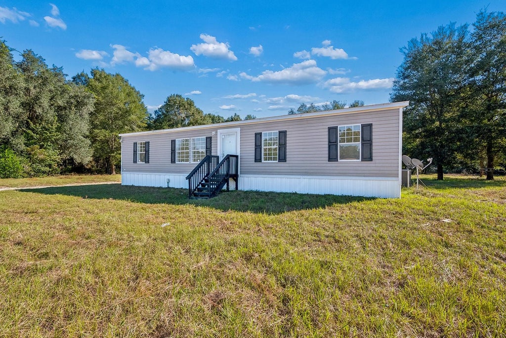 Photo of 17571 NW 71st Avenue, Trenton, FL 32693 (MLS # GC544490)