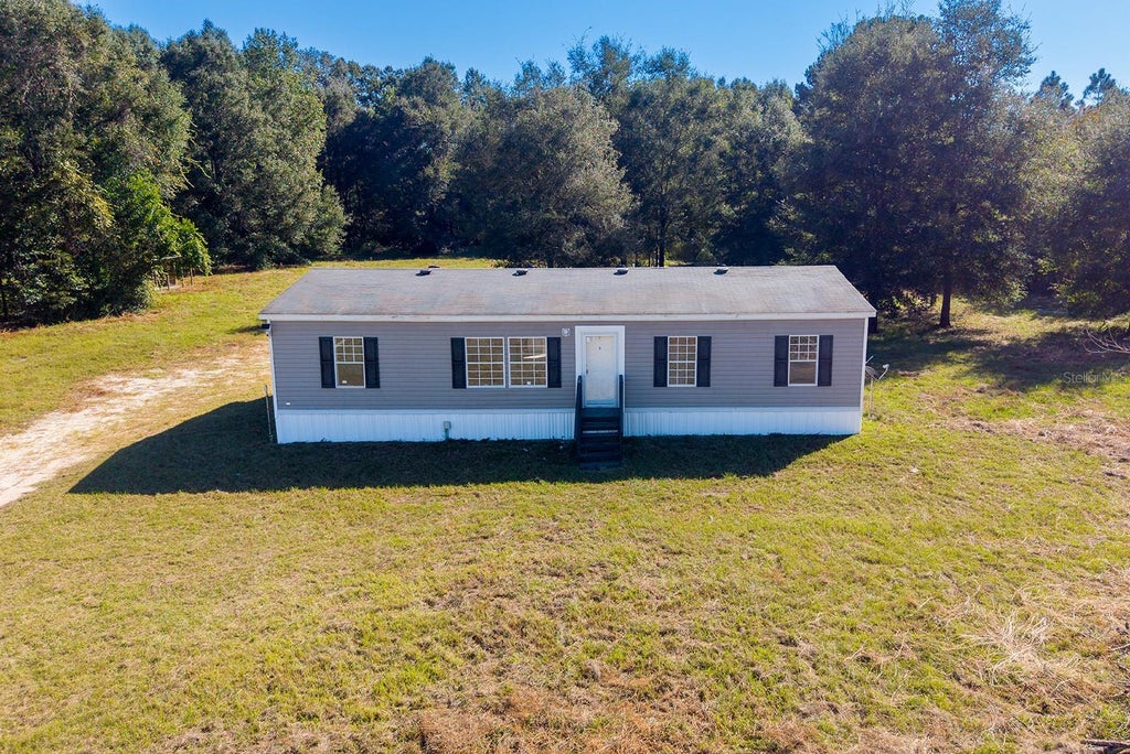 Photo of 17571 NW 71st Avenue, Trenton, FL 32693 (MLS # GC544490)