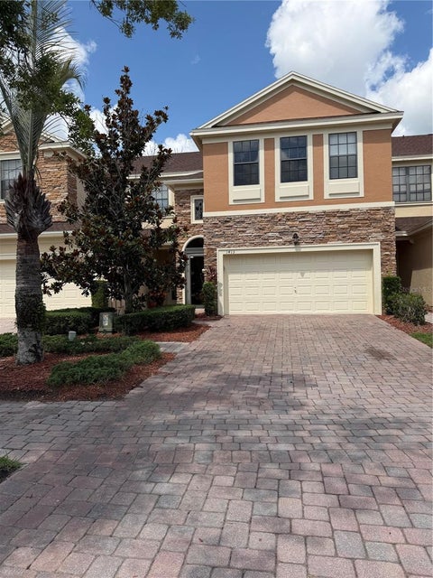 Photo of 1413 Portofino Meadows Boulevard, Orlando, FL 32824 (MLS # O6417267)