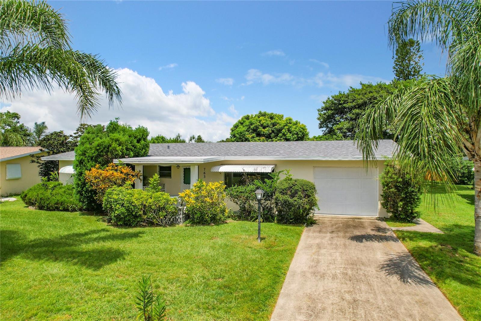 NEW REDUCED PRICE!
A perfect home for a first time buyer located in a quiet well maintained neighborhood in River Park Community.
NEW ROOF (2022) NEW A/C (2022).
Front porch with a welcoming entry to the home.
This Single family home has very spacious rooms and the floor plan features a 2 bedroom, 2 bathroom, living room has a picturesque window, dining area and an enclosed Florida room to enjoy all year around The master bedroom has a large closet and Kitchen has a large pantry and plenty of cabinets.
Terrazo flooring and hurricane/storm shutters on all windows.
Lots of storage cabinets in garage.
Beautiful large backyard with lush landscaping and no rear neighbors, enjoy the mango tree and banana tree.
Own this home today!