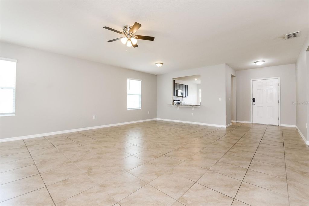 Photo of 571 Autumn Stream Drive, Auburndale, FL 33823 (MLS # O6366694)