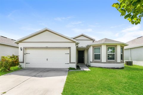 Photo of 571 Autumn Stream Drive, Auburndale, FL 33823 (MLS # O6366694)