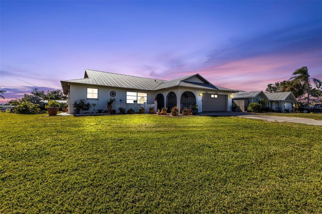 Photo of 27409 Voyageur Drive, Punta Gorda, FL 33983 (MLS # C7515584)