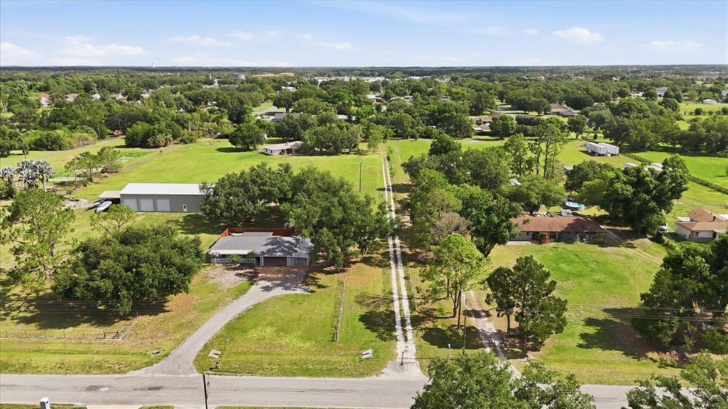 Photo of 9704 25th Street E, Parrish, FL 34219 (MLS # A4693931)