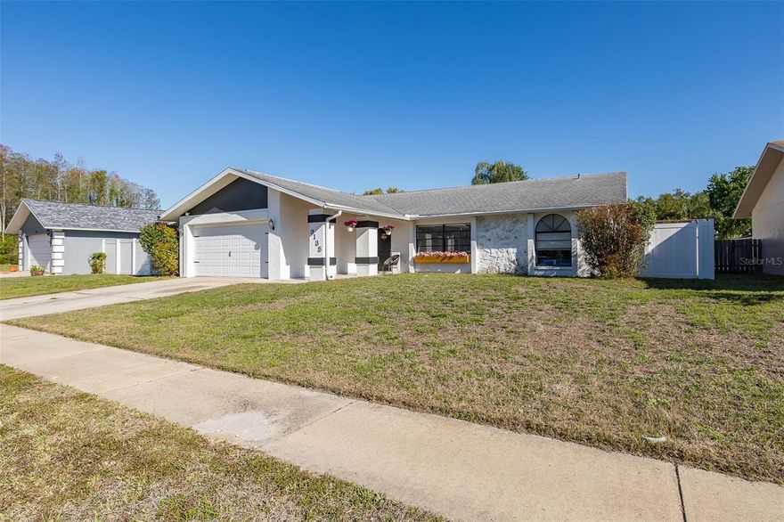 Welcome to this beautifully remodeled 3-bedroom, 2-bath pool home located in the highly desirable River Crossing community. Thoughtfully updated and move-in ready, this home offers both style and functionality with major improvements already completed, including a new roof (2019) and A/C (2020). Inside, you’ll find a modern, open layout featuring durable tile flooring throughout. The updated kitchen is a standout, showcasing white shaker cabinetry, quartz countertops, stainless steel appliances, and a spacious breakfast bar that flows seamlessly into the dining area—perfect for entertaining or everyday living. The flexible dining space can also serve as a second living area or family room. The primary suite offers a comfortable retreat with a generous walk-in closet and a beautifully updated en-suite bath featuring dual sinks and a stunning walk-in shower. Two additional bedrooms are well-sized and share a tastefully renovated guest bathroom. A bonus room adds even more versatility, ideal for a home office, den, or playroom. Step outside to your private backyard oasis, complete with a covered patio and an inviting in-ground pool—perfect for relaxing or hosting gatherings. The fully fenced yard provides added privacy and peace of mind. Ideally located just minutes from Starkey Wilderness Park, where you can enjoy miles of scenic trails for biking, jogging, and outdoor recreation, as well as nearby shopping, dining, and golf. This home offers the perfect blend of comfort, convenience, and Florida living at its finest.