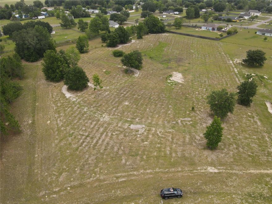 Discover the perfect 5-acre lot tucked away on a serene private road, ideal for individuals seeking a small farm homestead in the coveted Meadows on the Prairie subdivision. This residential space is a haven for those dreaming of a self-sufficient lifestyle!

If you envision raising little ones amidst the wonders of nature, this property is zoned for Archer Elementary, Oak View Middle School, and Newberry High School.

Embrace the centralized location, as this remarkable piece of land is mere minutes from the esteemed University of Florida, Shands Hospital, and the vibrant hub of Gainesville's shopping and entertainment scene along Archer Road. Now is your opportunity to invest in becoming an integral part of the thriving Gainesville community, while building the idyllic homestead of your dreams.

Immerse yourself in the joys of sustainable living, cultivating your own garden, and tending to a small farm with ease. This expansive property holds the promise of a self-sufficient lifestyle, allowing you to embark on an enchanting journey of farm-to-table living, all within the embrace of the remarkable Gainesville city.

Note: Please ensure to verify any specific zoning or land use regulations relevant to your farming aspirations.