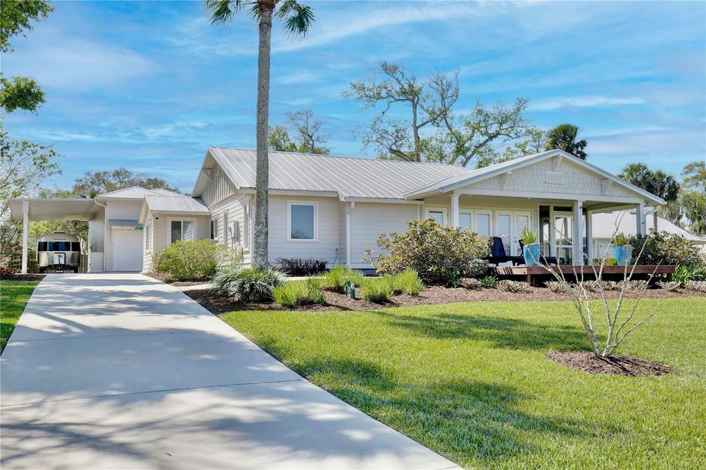 Photo of 210 N Riverside Drive, Edgewater, FL 32132 (MLS # O6393544)