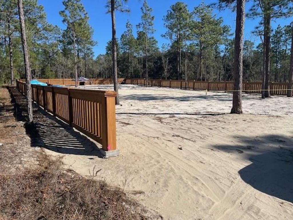 Photo of 2003 SW Deerpark Heights Road, Dunnellon, FL 34431 (MLS # OM718212)