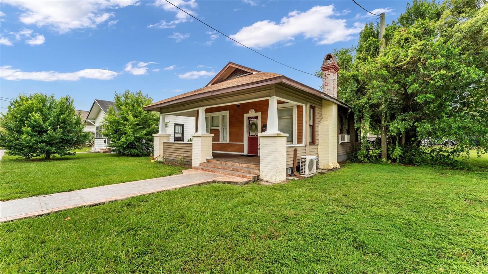 Just Listed FOR SALE! Fall in love with the charm of this 2-bedroom, 1-bathroom historic cottage just steps from the best of Downtown Lakeland and scenic Lake Mirror. With its welcoming front porch, warm character, and walkable location, this home offers the perfect blend of history and convenience. You will LOVE the charming historic details including refinished hardwood floors, trim work, built-ins, and the entire home is light and bright with lots of windows. Inside, you’ll find light-filled living spaces that feel comfortable and inviting, with just the right amount of room to make your own. The kitchen, dining, and living rooms are cozy yet functional, ready for everything from morning coffee to casual dinners with friends. Two bedrooms and a full bathroom provide a simple, easy-to-maintain layout that’s ideal for first-time buyers, downsizers, or anyone looking to enjoy the downtown lifestyle. This property has had a strong long term rent history. Buy it for yourself or add to your investment portfolio! *Tenant moving out now, so showings start on Friday September 19th.*
You can't beat the location! Step outside and enjoy being within walking distance to local shops, restaurants, farmers market, and community events—or take a peaceful evening stroll around Lake Mirror.
The sellers are looking to sell as-is for their convenience. *Everything is in overall good condition and the house just passed a 4 point inspection. (copy available upon request)
Conventional loans or cash only please.
If you’ve been dreaming of a home with character in the heart of Lakeland, this little cottage is ready to welcome you.
Priced to sell quickly! CALL TODAY!