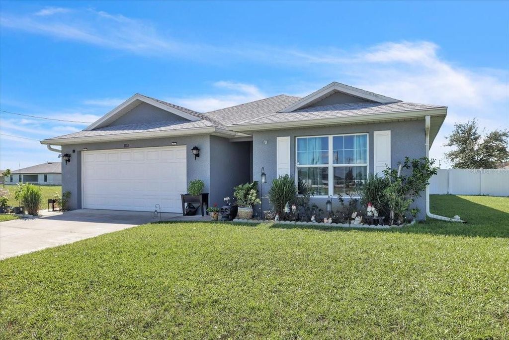 Photo of 1718 NW 19th Terrace, Cape Coral, FL 33993 (MLS # C7515190)