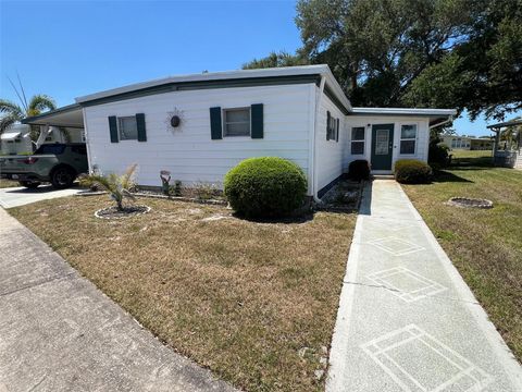Photo of 18 Sabal Palm Drive, Largo, FL 33770 (MLS # TB8498772)