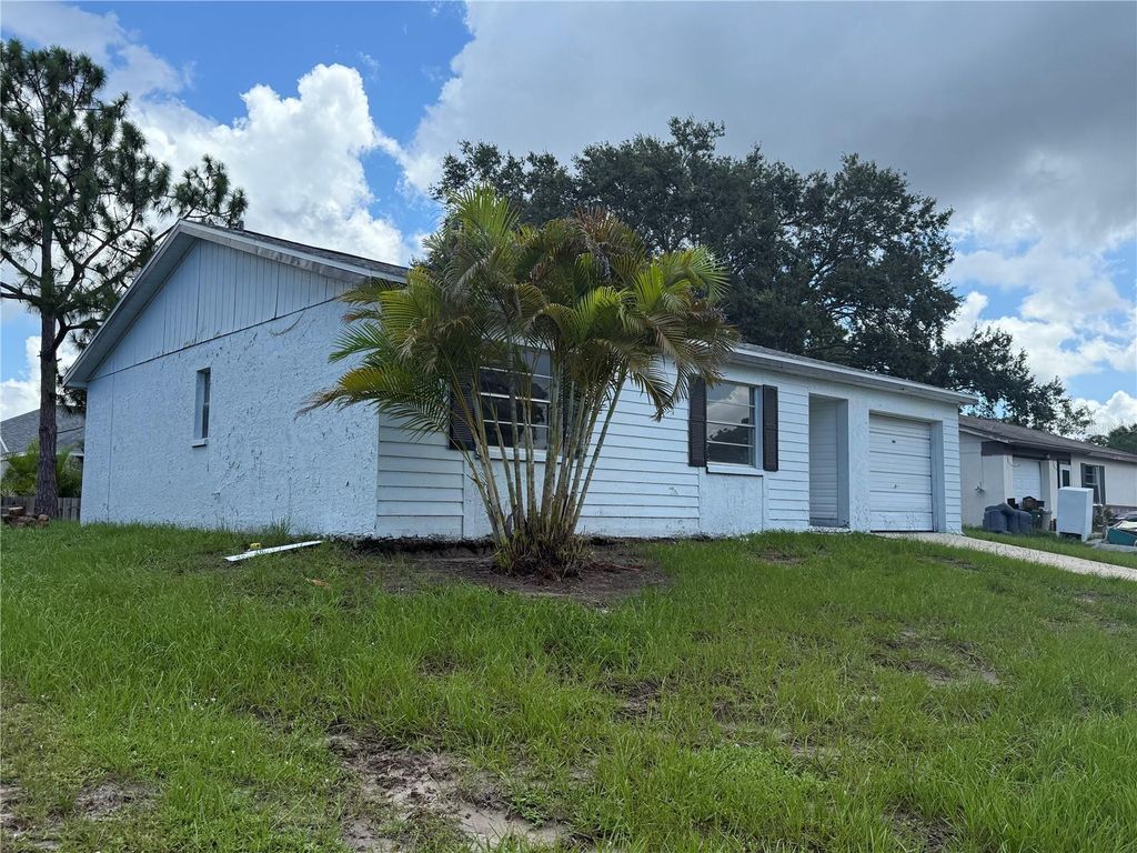 Photo of 1308 Dukes Drive, Tarpon Springs, FL 34689 (MLS # TB8408412)