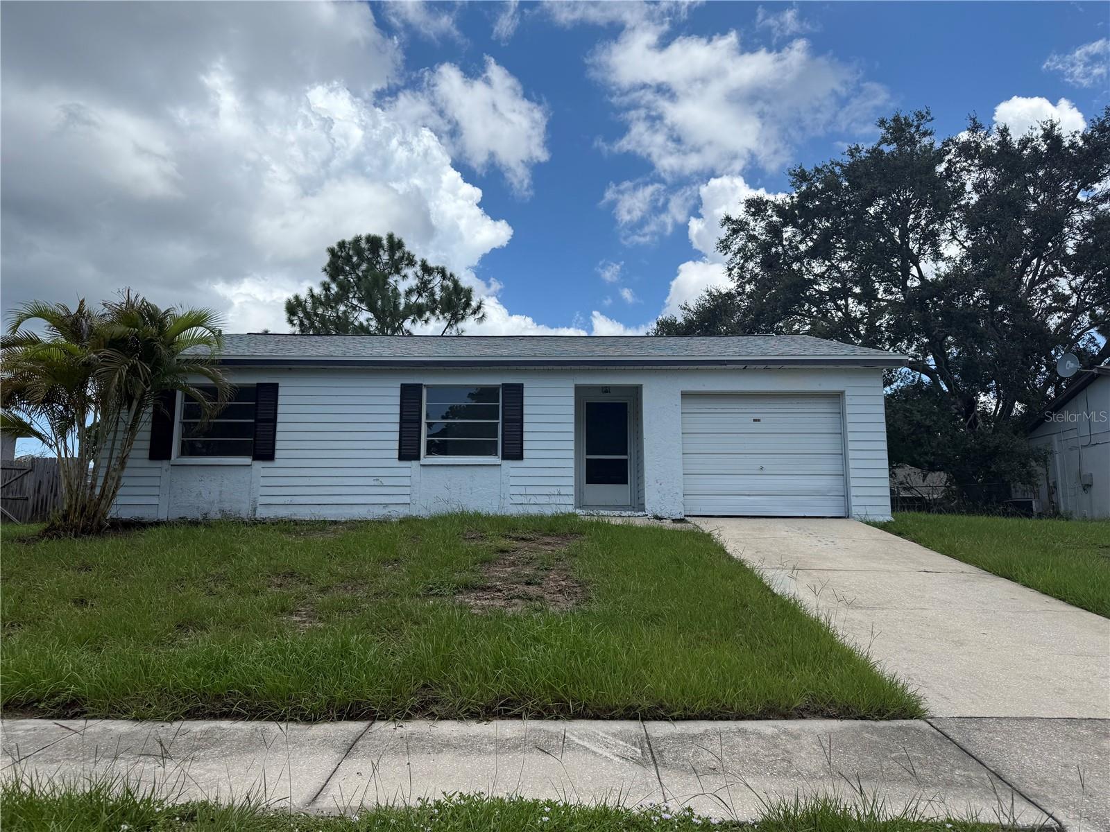 Discover the potential of this block construction 3-bedroom, 2-bath home tucked away on a spacious 70x100 lot in the heart of Tarpon Springs. Featuring a 2022 roof, newer 3-year-old AC, a 2-year-old water heater, and a 200-amp electrical panel, this property already has key system upgrades in place. Inside, you’ll find a traditional floor plan ready for your vision and personal touch. Whether you’re looking for a primary residence, a project to renovate, or an investment property, the possibilities are endless. The large yard provides plenty of room for outdoor living, gardening, or even a future pool. Located in a non-HOA neighborhood just minutes from the vibrant downtown area, historic sponge docks, and Gulf beaches, this home offers convenient access to all that Tarpon Springs is known for. With its X500 flood zone designation, you’ll enjoy peace of mind while living near the water. Bring your ideas and make this house your home!
Bring your ideas and make this house your home!