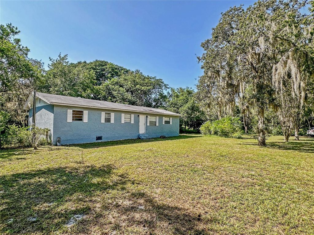 Photo of 13103 Grassy Lane, Hudson, FL 34669 (MLS # TB8418293)