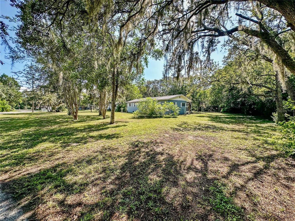 Photo of 13103 Grassy Lane, Hudson, FL 34669 (MLS # TB8418293)