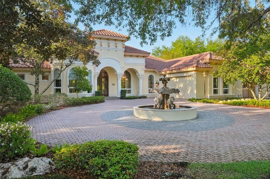 This impeccable Tuscan-style estate sits on a full acre in Northbridge at Lake Pretty—one of Odessa’s premier gated communities which is set along an 85-acre private ski lake, offering a balance of privacy, space, and modern living that’s hard to match.

Right from the start, this property separates itself with a rare feature: a detached oversized workshop/garage with 220 electric and space for up to six vehicles. Combined with the main garage and extended driveway, it delivers exceptional flexibility for car collectors, hobbyists, or anyone needing a true work or storage setup—something you simply don’t see often in this area.

The home makes a statement with a circular paver driveway and fountain centerpiece leading to stately double glass entry doors. Inside, you’ll find fresh interior paint, soaring ceilings, and expansive open living spaces. Grand architectural details like coffered ceilings and crown molding add character, while the single story layout offers the flow and functionality today’s buyers seek.

Right at the entry is a true executive office providing a quiet, private workspace—ideal for working from home without interruption. The formal living and dining areas feature abundant natural light, elegant marble flooring and French doors, creating a refined setting for entertaining. The adjacent family room is where you'll spend your time, with a gas fireplace, built-in media area, and a full wall of French doors that flood the space with natural light and open seamlessly to the lanai, and overlooks the massive kitchen.

7908 Foxcatcher's kitchen is both functional and impressive, designed to handle everyday living and gracious hosting. It features a professional grade six-burner Thermador gas cooktop, Thermador double ovens, Sub-Zero refrigerator, rich granite countertops, solid wood cabinetry with multiple pullout drawers and spice racks, huge walk-in pantry, and an expansive center island with prep sink. The adjoining dinette is bright and inviting, surrounded by windows that overlook the pool and outdoor living space.

The primary suite offers a true retreat, complete with a sitting area and direct access to the lanai. The en-suite bathroom is spacious and well-appointed, featuring a garden tub, upgraded finishes, and custom closets. Secondary bedrooms include plantation shutters and charming window seats, while a sunroom with built-in desk and shelving provides the perfect flex space for a second office, studio, or reading room. A fully furnished media room adds even more versatility and entertainment value.

Outdoors is where this home truly stands out. The screened lanai is designed for year-round enjoyment, featuring a heated saltwater pool and spa, a tranquil koi pond, and a beautiful gazebo. The outdoor kitchen—complete with a gas grill, vent hood, and prep space—makes entertaining effortless. Just beyond, a dedicated fire pit area with a pizza oven creates a relaxed, inviting space for gathering with family and friends.  Upgrades and extras also include a whole home generator.

Residents of Northbridge at Lake Pretty enjoy private access to the lake for kayaking, paddleboarding, and other water activities, all within a quiet, gated community just minutes from top-rated schools, shopping, and dining.

Bottom line: this is a rare opportunity to own a property in a coveted Odessa location that delivers on space, functionality, and lifestyle—with standout features that are increasingly hard to find.