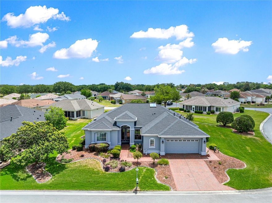 LUXURY HOME AT IT"S FINEST!! Expanded Furnished 2BR + DEN / 2.5 Bath Hampton Model, .40-Acre Corner Lot in SAWGRASS Offered Fully Furnished & Move-In Ready. Experience a rare combination of privacy, luxury, and meticulous maintenance in this exceptional Home. Situated on a sprawling corner lot with a private backyard oasis, this home has been thoughtfully upgraded from top to bottom. As you enter the home entryway thru the grand 8-foot leaded glass front doors creates an impressive first impression followed by the 10-foot ceilings accented by elegant crown molding and 8-foot interior doors create an airy, upscale atmosphere. Gourmet Kitchen features new rich cherry 42" cabinetry, granite countertops, double ovens, a glass backsplash, and a large skylight that floods the space with natural light, Modern, newer stainless appliances. Stunning herringbone tile runs throughout the entire home. Primary Suite: is a private retreat boasting vaulted ceilings and a luxury 6-foot soaking tub. Comfort Features: Gas fireplace in the family room and plantation shutters on every window for perfect light control. The "Ultimate" expanded Garage, A true showstopper for car enthusiasts or hobbyists: Unique "Penny" Flooring: A one-of-a-kind conversation piece, extensive custom cabinetry and a screened garage door.  Includes a dedicated golf cart garage and a Club Car Precedent golf cart with the sale. The spacious backyard features an open brick patio with a gas BBQ.  Dedicated well for irrigation keeps the lush landscaping green year-round. Recent Upgrades Feature Updated Well Pump 2026, Windows & Screens 2025–2026 (Brand New), including double 8' front door screens, Lanai Mini-Split 2025, Roof 2022, Exterior Paint 2022, Climate Control 3-Zone System for precision cooling 2014 and 2016.