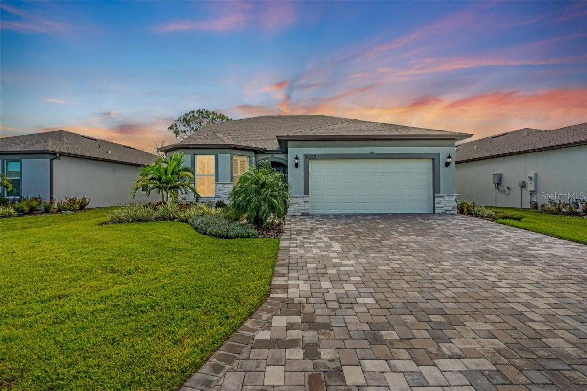Nice Nice Nice! Owner meticulously added so many upgrades in the building selection. Extra lighting, Extended length garage, pre-wiring and gas hookups for future pool. Outdoor kitchen hookups. Level 5 cabinets, Upgraded carpet, Chef's kitchen upgrade package, Zero entry shower, Extended Lani, Stone front upgrades, recessed lightning in every room and hallways, the list goes on! After purchasing owner added more upgrades, garage climate control, extra insulation, custom garage floor, custom L.E.D. lighting in garage, garage cabinets, all closets have been custom built out...some with ELFA custom shelves/drawers. 9 years remain on structural warranty. This home is special and you must see in person to appreciate how Mr. & Ms. Meticulous have built it out. Life called and owners reluctantly have to relocate. Ready for immediate occupancy. Don't try to build one for this price... it would certainly cost more.