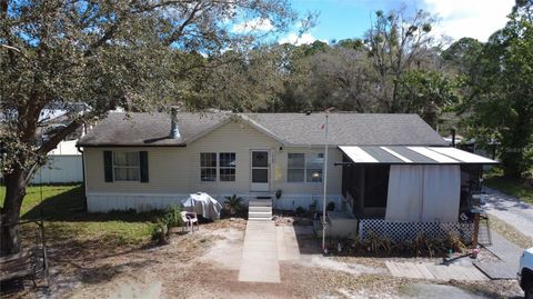 Photo of 1403 Saint Nicholas Avenue, Christmas, FL 32709 (MLS # GC538049)