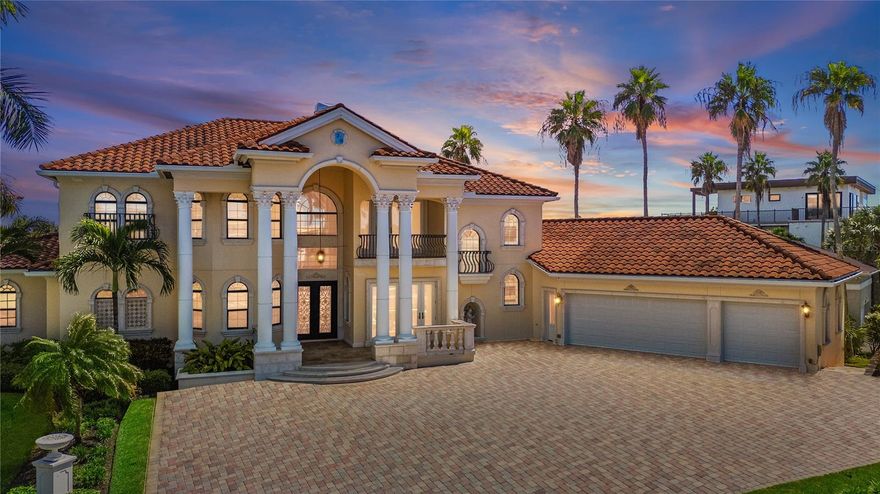 Step into elevated elegance at this Mediterranean-style masterpiece on Belleair Beach’s famed Gulf Boulevard. Built in 2013 on a rare slope—and untouched by recent storms—this five-bedroom, 5.5-bath estate delivers the peace of mind of hurricane-rated windows and doors, plus a whole-house Generac generator and full smart-home integration. Everything you love, controlled right from your phone: lights, climate, security, irrigation, and pool.

From the moment you enter, it's pure drama. Italian-imported marble floors and columns set the stage, crowned by a show-stopping crystal chandelier. The chef’s kitchen is a culinary stunner—exotic granite, custom wood cabinetry, a six-burner gas range with pot filler, double ovens, and a secret stash of hidden storage. There's even a temperature-controlled wine cellar ready for your personal touch.

The open-concept family room flows seamlessly outdoors through French doors, with coffered ceilings adding a touch of grandeur and acoustic magic. The primary suite is its own sanctuary, complete with a cozy sitting area and a spa-worthy bath dripping in marble, glass, and stone. Every guest room comes with a private en-suite bath, offering luxe accommodations all around.

Outside, your private resort awaits. The saltwater pool and spa shimmer beneath the Florida sun, framed by natural stone pavers, lush lounging spaces, an outdoor kitchen with an infrared grill, and a custom-tiled outdoor shower worthy of a boutique hotel. From intricate wrought-iron staircases to custom steel detailing, the craftsmanship here is unforgettable.

Just steps from the sugar sand shores of Belleair Beach and moments from the marina, this estate is made for sun-chasers and boat-lovers alike. Clearwater Beach’s energy is minutes away, while quieter coastal escapes are right around the corner. With Tampa International Airport under 40 minutes away, your luxury escape is always within reach.

This is more than a home—it’s a lifestyle. Come feel it.