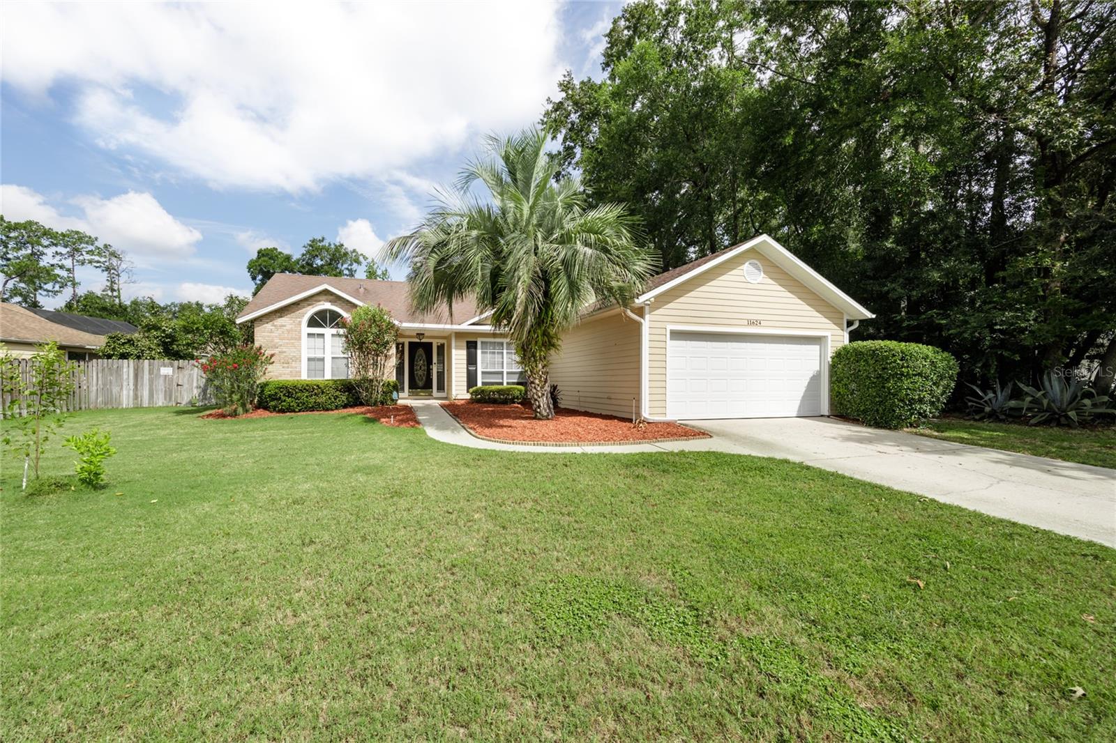 Rare opportunity to own one of the few pool homes at this price point in west Gainesville! This 3BR/2BA home features a screen-enclosed saltwater pool with new pump, and second covered outdoor area all perfect for outdoor activities and entertaining. You’ll enjoy the fabulous curb appeal, a fully fenced yard, and spacious side area.
With well-designed spaces for both formal and festive occasions, the dining room flows alongside the living room complete with a charming brick fireplace. While the addition of the 250 sq ft den provides flexibility as a game room, play area, or home gym. The updated kitchen offers granite counters, tile backsplash, stainless steel appliances, double oven, and new dishwasher. There is also a new tankless water heater.
Easy-care flooring throughout - no carpet!
The split floor plan includes a large master bedroom with shower and soaking tub. The two guest rooms are divided by an updated bathroom with walk-in shower, new flooring, and updated fixtures.
Move-in ready and located close to highly rated schools, Publix, Aldi (coming very soon), medical care, local restaurants, and recreation.