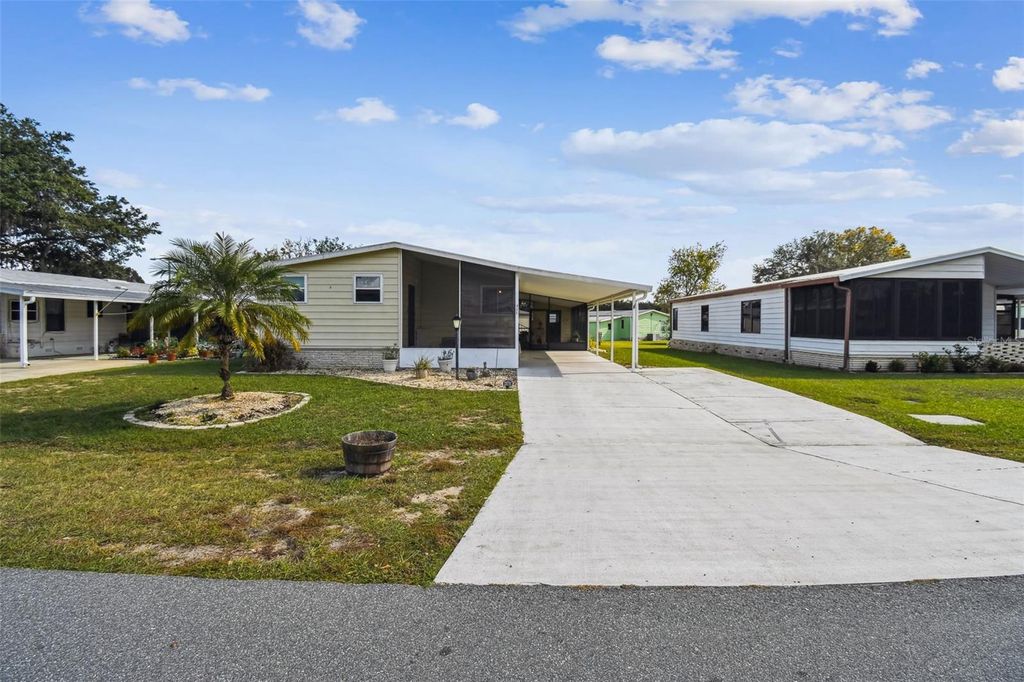 Photo of 711 Polo Park Boulevard, Davenport, FL 33897 (MLS # O6362736)
