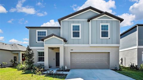Photo of 10090 Gentle Rain Drive, Land O Lakes, FL 34638 (MLS # TB8437968)