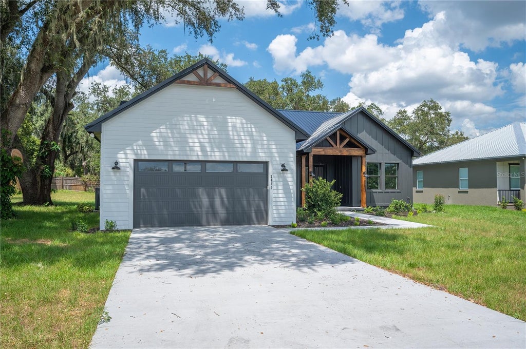 Photo of 2411 Old Medulla Road, Lakeland, FL 33811 (MLS # L4962029)