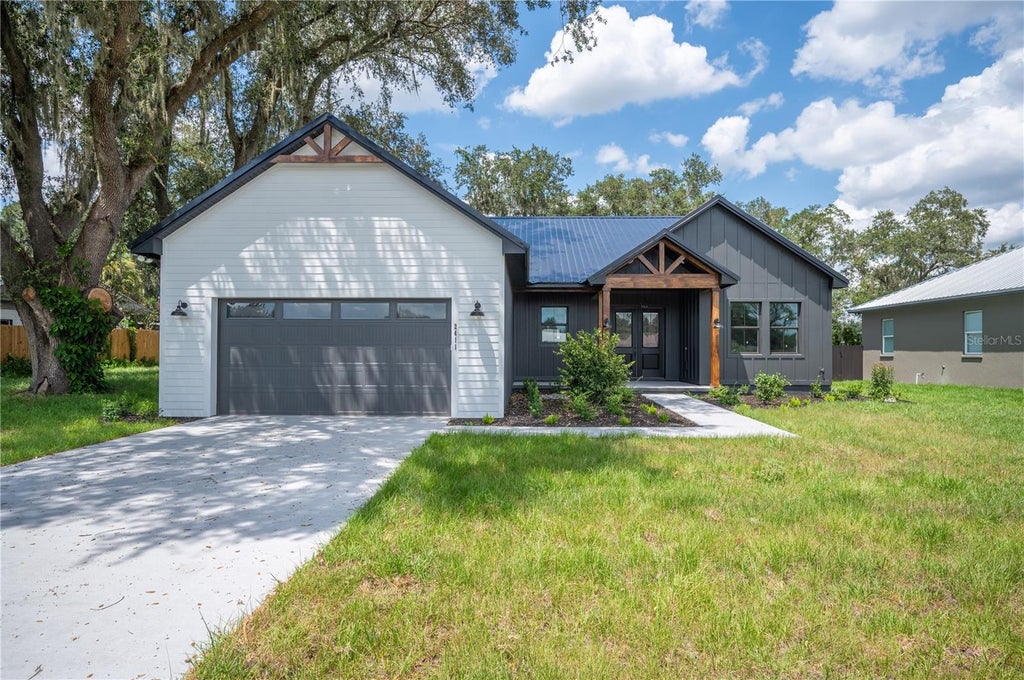 Photo of 2411 Old Medulla Road, Lakeland, FL 33811 (MLS # L4962029)