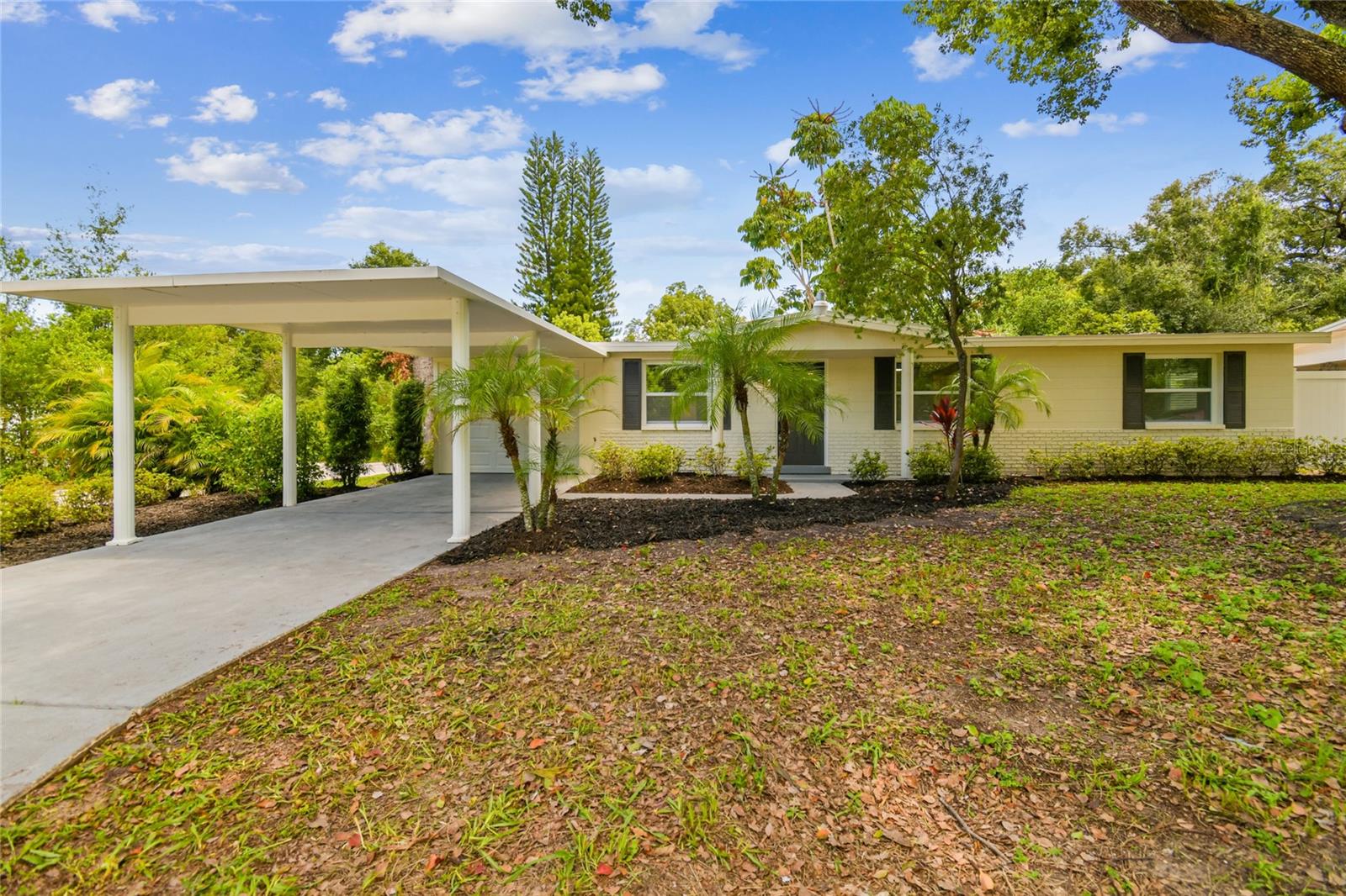 WELCOME TO YOUR NEW HOME IN TAMPA SEMINOLE HEIGHTS HOME ?! This stunning 3-bedroom, 2-bathroom and NEW SCREEN PORCH and complete new vinil fence arrown the property for you privacy , this home has been completely remodeled from top to bottom with new water heat system 2025 and NEW 2025 WINDOWS and AC 2023 for ensuring durability and peace of mind for years to come, is move-in ready. Featuring nearly total area 1342 square feet of fresh, stylish living space, every detail has been thoughtfully updated for comfort and functionality. The brand-new kitchen boasts all-new appliances and cabinets, perfect for easy cooking and entertaining and a beautiful yard offering both privacy and convenience. No HOA or deed restrictions here. Step inside to a spacious living area, with two bedrooms and an updated main bath just off the living space. The central kitchen and dining area create the perfect spot for entertaining and gathering with family. Located on a corner lot, this property is close to vintage shops, eclectic eateries, and local breweries. This home is in a great commuter location with easy access to downtown Tampa and other area amenities. Whether you're heading to work, exploring the vibrant city life, or visiting nearby parks and recreational spots, you'll find it all within a short drive. The functional kitchen offers the potential for a complete remodel to fulfill your culinary dreams. This charming home also boasts two nicely sized bedrooms and the vintage bathroom adds a touch of days-gone-by. It sits on a generous lot that offers ample space for outdoor activities, with possibilities for gardening and landscaping. The expansive backyard has room for a garden, a play area, or maybe even a pool. The home features an attached one-car garage, complete with an attached 8x11 compact work/storage space and a large, 10x29 new screened patio. Additionally, an attached covered parking space can double as a front gathering spot, ideal for enjoying morning coffee or evening relaxation. Don't miss out on this unique opportunity to breathe new life into a home with great bones and amazing potential. Schedule a viewing today and start imagining the possibilities!