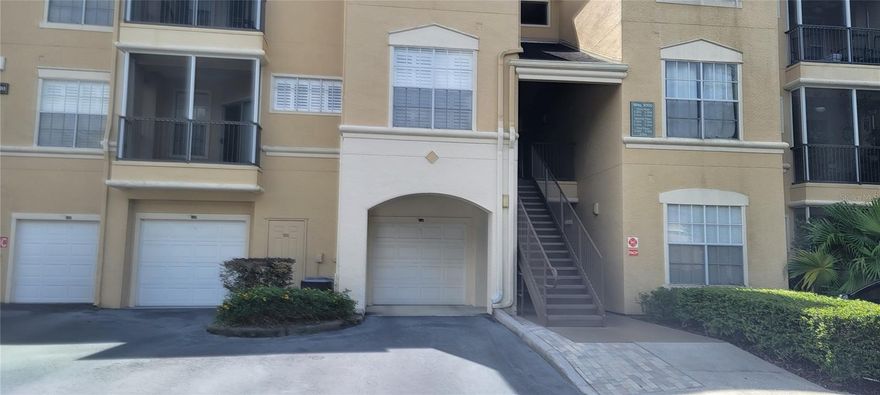 Well maintained 2 BR 2 bath Condo with a GARAGE directly below the unit in this 24-hour guard-gated community of OXFORD PLACE in Tampa Palms Open kitchen with wood cabinets flow into the roomy dining/family room. Cathedral ceilings, wood floors, crown molding and plantation shutters too. The inside laundry room comes complete with a washer and dryer. The community is gated 24 hours a day, with a Resort-Style Pool with fountains, Clubhouse and a Fitness Center, a community car wash, playground, volleyball court, and valet trash service. Being a resident of Oxford Place provides you with FREE access to the Club Tampa Palms just down the street. Club Tampa Palms offers a heated pool/spa, Full Fitness Center equipped with locker rooms, shower, sauna, meeting rooms, kitchen, and bar. Lighted tennis and basketball courts Conveniently located in the heart of Tampa Palms, close to I-75, USF, shopping, dining, and more.